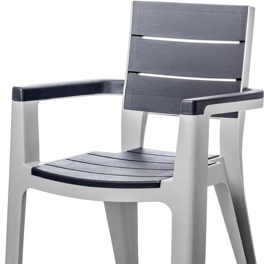 HomeRoots Nine Piece Gray Plastic Outdoor Patio Set with Table