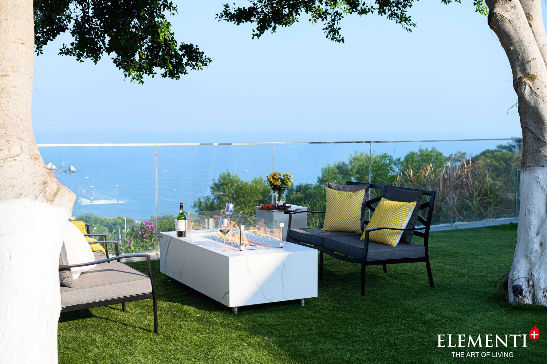 Carrara fire table lifestyle scene