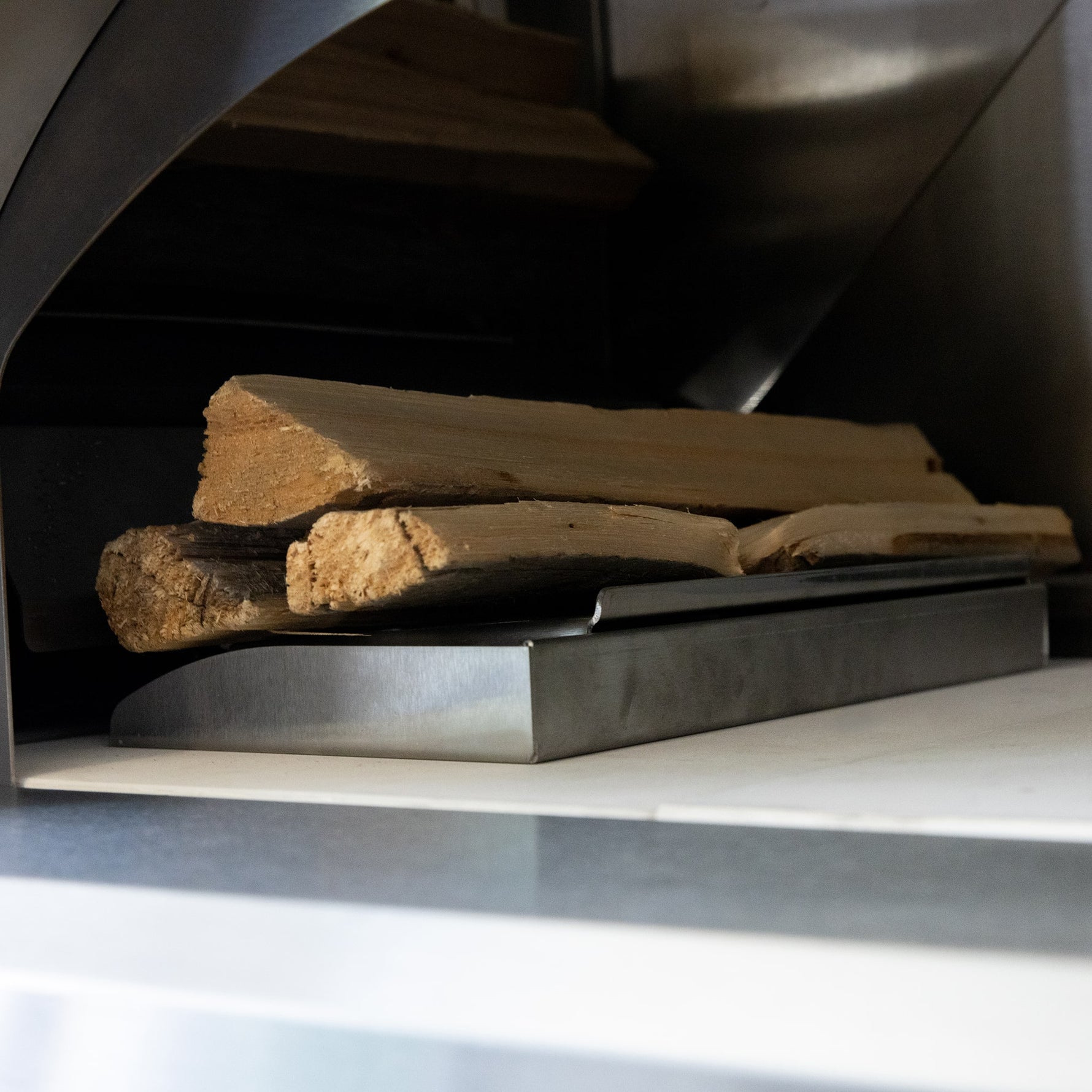 Summerset Hybrid Pizza Oven NG — wood rack and ash catch