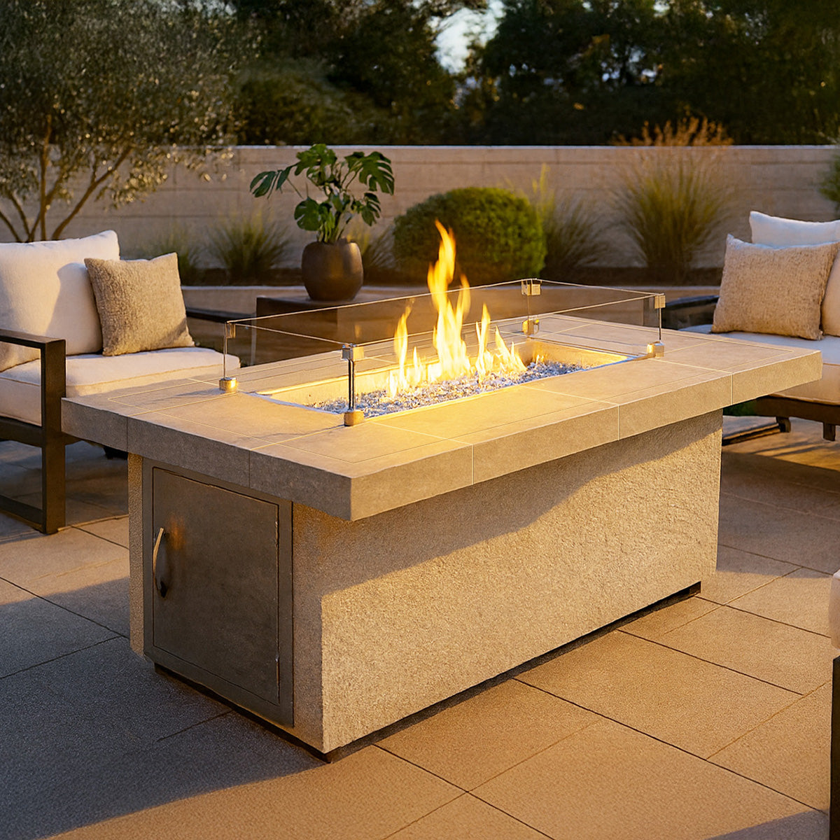 Cal Flame Phoenix 38 by 60-inch rectangular gas fire pit table on contemporary outdoor patio