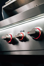 Summerset Quest grill red-lit knobs detail showing knobs glowing red when burners on