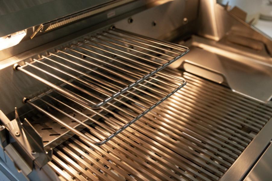 Summerset Quest grill warming rack in position 2 showing dual-position storage