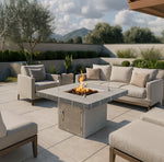 Cal Flame Mesa modern outdoor gas fire pit table with flames on a contemporary patio