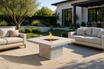 Cal Flame Sedona 48-inch square outdoor gas fire pit table with flames on a patio